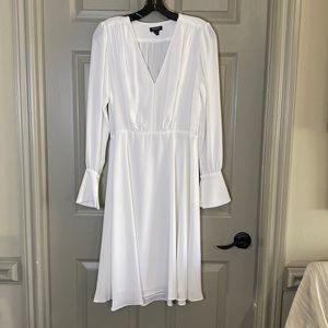 Worth dress with matching belt accessory. Never worn